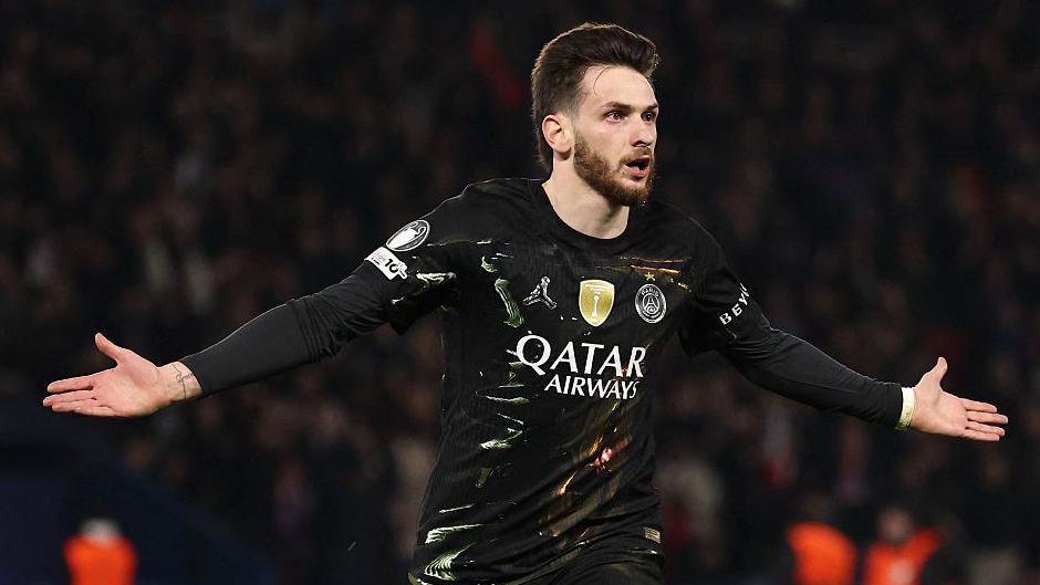 Khvicha Kvaratskhelia celebrates scoring against Chelsea