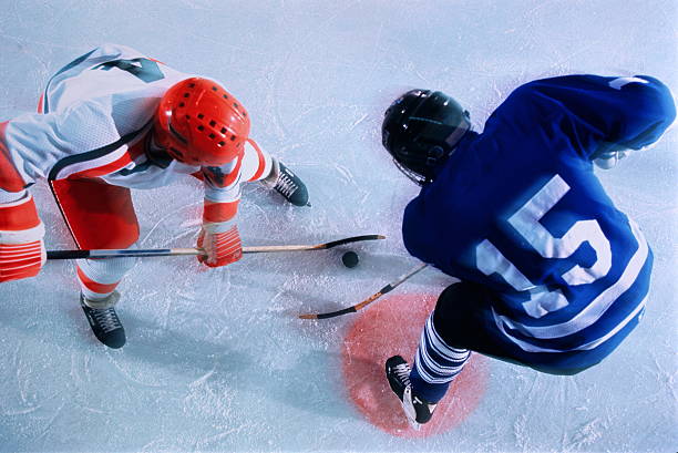 ice hockey players in face off
