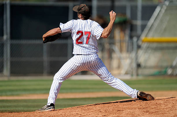 Baseball pitcher throwing the ball