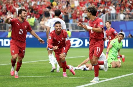 Portugal players celebrate fourth goal vs Uzbekistan